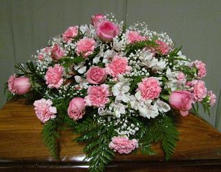 Pink & white casket spray  from Krupp Florist, your local Belleville flower shop