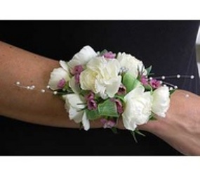 Carnation Wrist corsage w/waxflower from Krupp Florist, your local Belleville flower shop