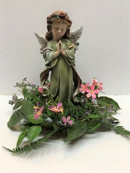 Praying angel with silk flower ring from Krupp Florist, your local Belleville flower shop