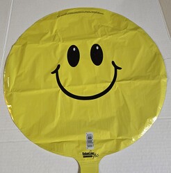 Yellow smiley face balloon from Krupp Florist, your local Belleville flower shop
